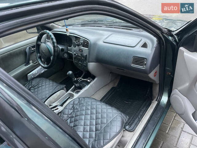 Зелений Ніссан Прімера, об'ємом двигуна 1.8 л та пробігом 295 тис. км за 2200 $, фото 10 на Automoto.ua