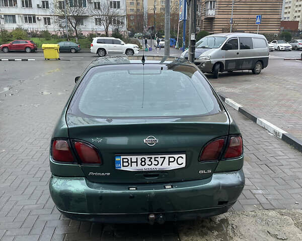 Зелений Ніссан Прімера, об'ємом двигуна 1.8 л та пробігом 295 тис. км за 2200 $, фото 4 на Automoto.ua