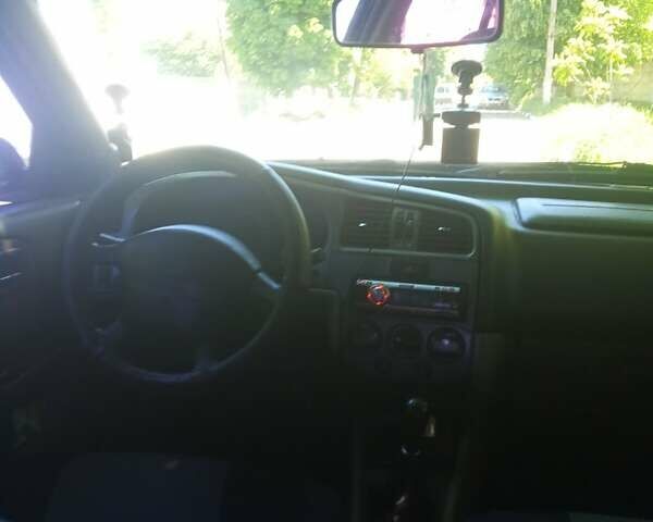 Зелений Ніссан Прімера, об'ємом двигуна 2 л та пробігом 380 тис. км за 2000 $, фото 2 на Automoto.ua