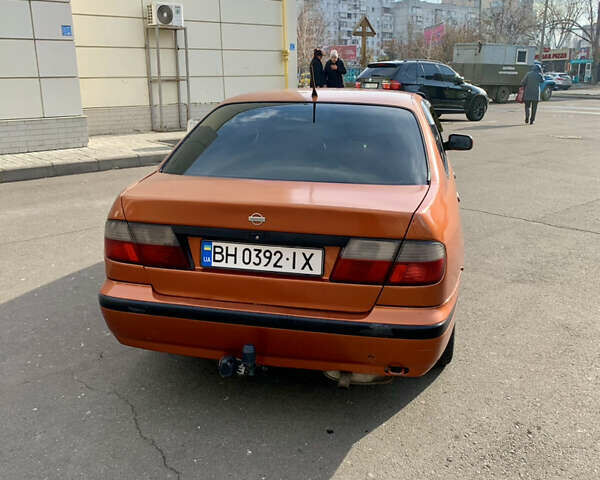 Оранжевый Ниссан Примера, объемом двигателя 2 л и пробегом 450 тыс. км за 2300 $, фото 3 на Automoto.ua