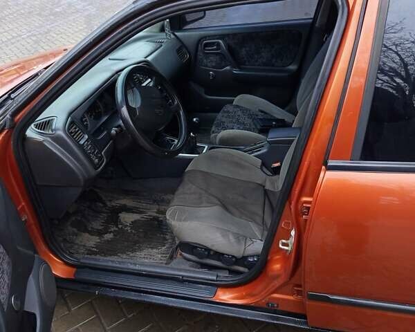 Помаранчевий Ніссан Прімера, об'ємом двигуна 1.6 л та пробігом 293 тис. км за 1800 $, фото 6 на Automoto.ua