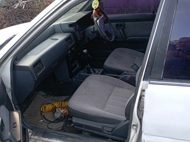 Білий Ніссан Пульсар, об'ємом двигуна 1.5 л та пробігом 150 тис. км за 558 $, фото 6 на Automoto.ua