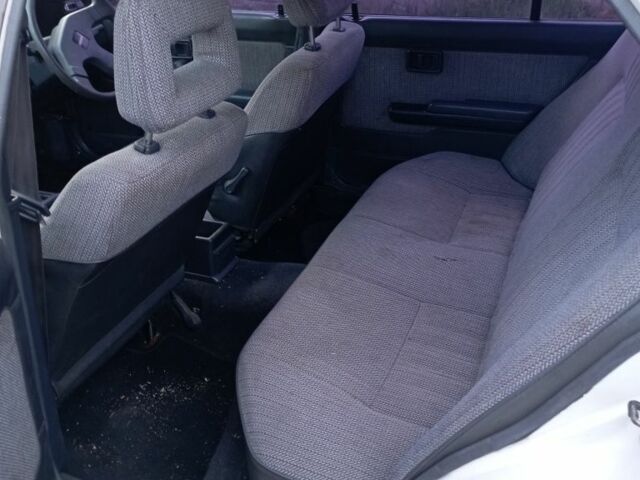 Білий Ніссан Пульсар, об'ємом двигуна 1.5 л та пробігом 150 тис. км за 558 $, фото 5 на Automoto.ua