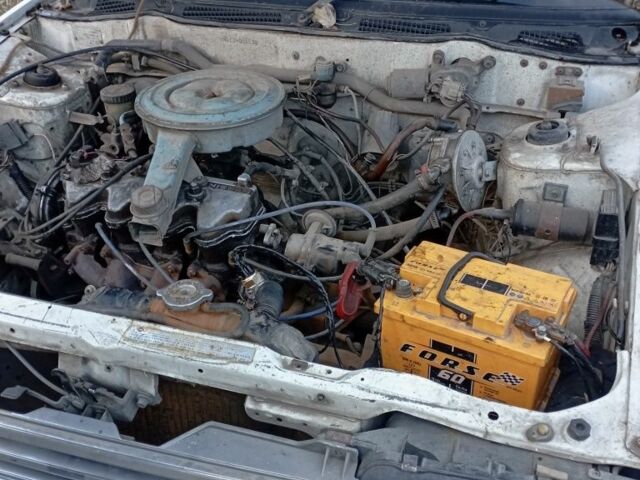 Білий Ніссан Пульсар, об'ємом двигуна 1.5 л та пробігом 150 тис. км за 558 $, фото 2 на Automoto.ua