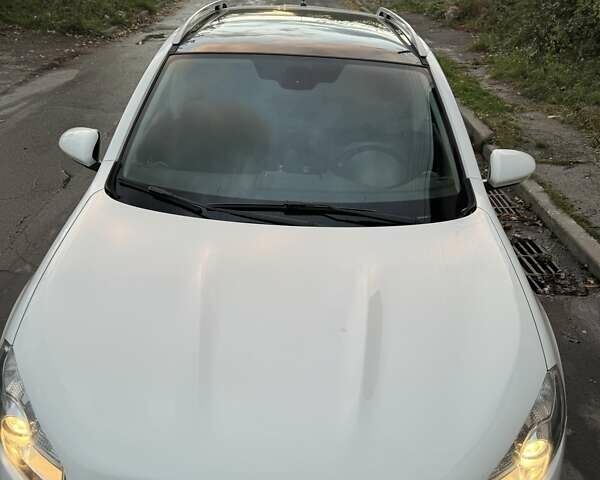 Белый Ниссан Кашкай, объемом двигателя 2 л и пробегом 159 тыс. км за 11200 $, фото 4 на Automoto.ua