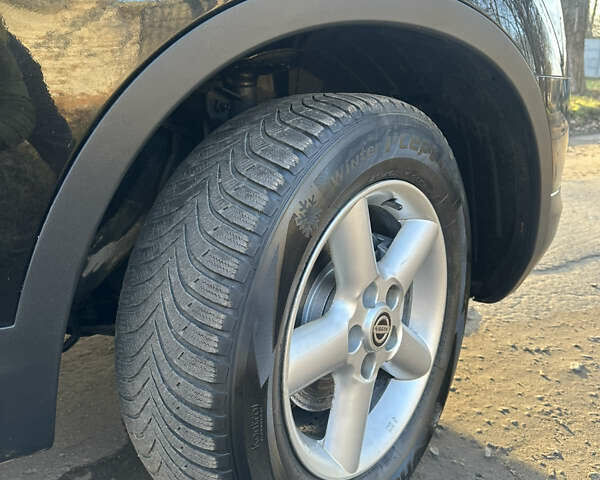 Черный Ниссан Кашкай, объемом двигателя 1.6 л и пробегом 196 тыс. км за 8599 $, фото 4 на Automoto.ua