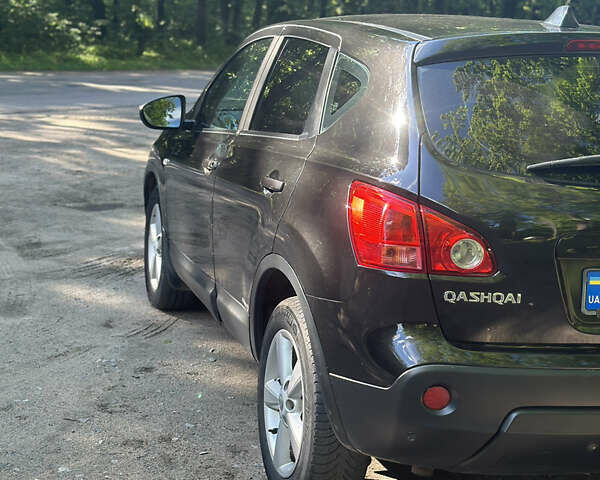 Чорний Ніссан Кашкай, об'ємом двигуна 2 л та пробігом 300 тис. км за 7400 $, фото 6 на Automoto.ua