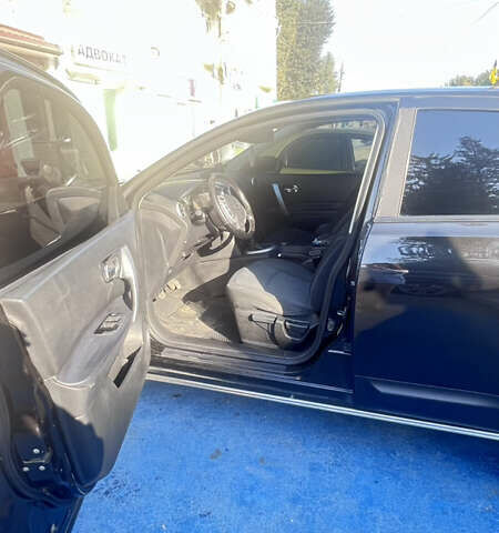Черный Ниссан Кашкай, объемом двигателя 2 л и пробегом 224 тыс. км за 8700 $, фото 2 на Automoto.ua