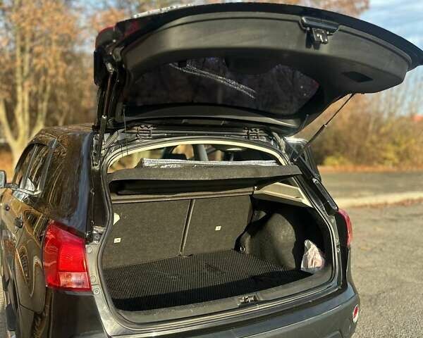 Черный Ниссан Кашкай, объемом двигателя 2 л и пробегом 219 тыс. км за 9300 $, фото 6 на Automoto.ua