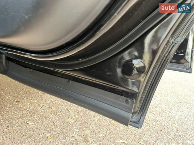 Чорний Ніссан Кашкай, об'ємом двигуна 2 л та пробігом 230 тис. км за 12299 $, фото 131 на Automoto.ua