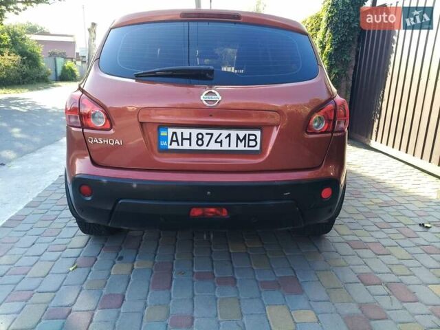 Красный Ниссан Кашкай, объемом двигателя 2 л и пробегом 205 тыс. км за 7700 $, фото 3 на Automoto.ua