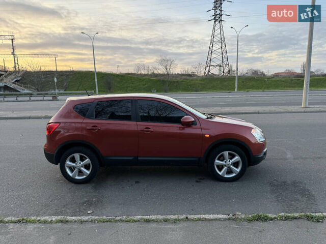 Красный Ниссан Кашкай, объемом двигателя 2 л и пробегом 235 тыс. км за 9900 $, фото 2 на Automoto.ua