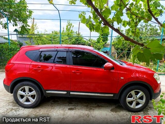 Красный Ниссан Кашкай, объемом двигателя 2 л и пробегом 160 тыс. км за 8200 $, фото 1 на Automoto.ua