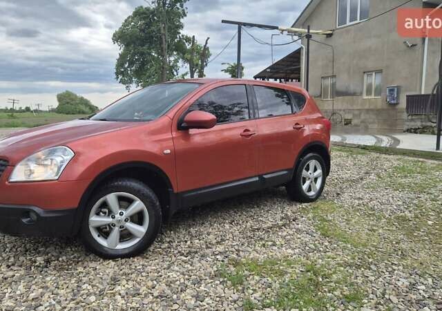 Красный Ниссан Кашкай, объемом двигателя 1.6 л и пробегом 217 тыс. км за 8300 $, фото 1 на Automoto.ua