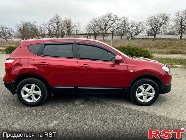 Красный Ниссан Кашкай, объемом двигателя 2 л и пробегом 61 тыс. км за 11400 $, фото 6 на Automoto.ua