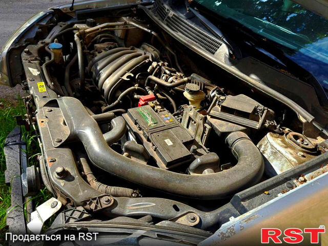 Серый Ниссан Кашкай, объемом двигателя 1.6 л и пробегом 260 тыс. км за 4200 $, фото 9 на Automoto.ua