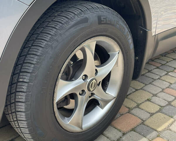 Сірий Ніссан Кашкай, об'ємом двигуна 2 л та пробігом 200 тис. км за 10450 $, фото 14 на Automoto.ua