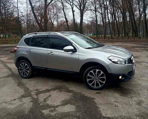 Серый Ниссан Кашкай, объемом двигателя 1.5 л и пробегом 243 тыс. км за 9950 $, фото 3 на Automoto.ua