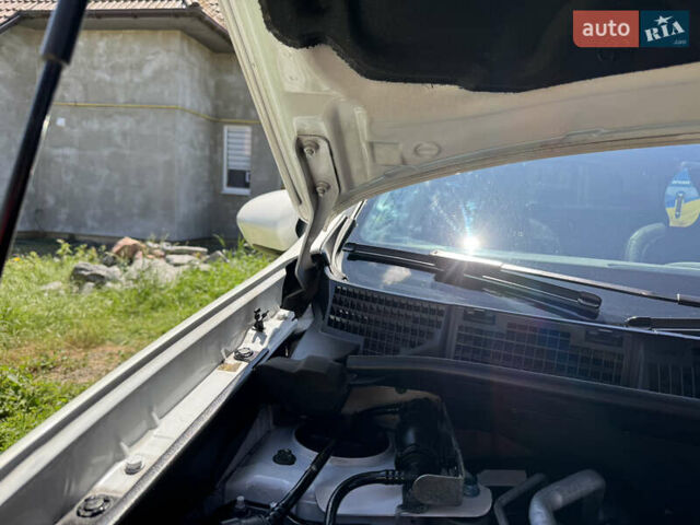 Білий Ніссан Кашкай 2, об'ємом двигуна 2 л та пробігом 220 тис. км за 14500 $, фото 132 на Automoto.ua
