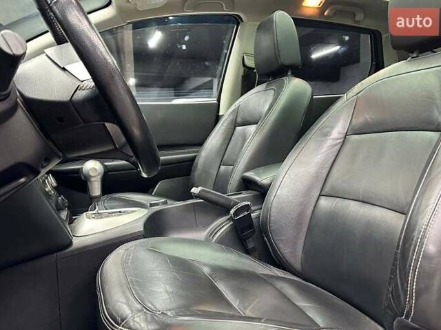 Черный Ниссан Кашкай 2, объемом двигателя 2 л и пробегом 242 тыс. км за 9899 $, фото 10 на Automoto.ua