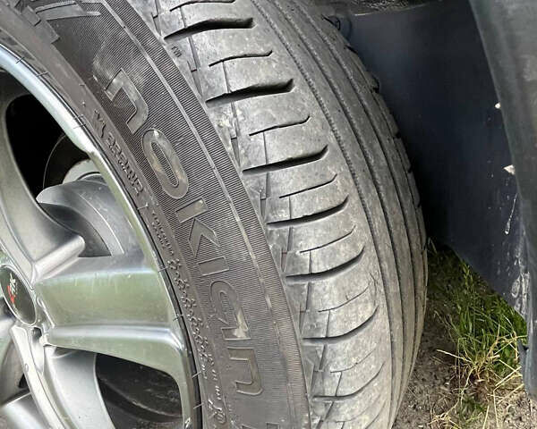 Черный Ниссан Кашкай 2, объемом двигателя 2 л и пробегом 239 тыс. км за 10500 $, фото 3 на Automoto.ua