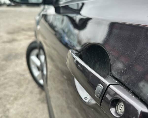 Черный Ниссан Кашкай 2, объемом двигателя 2 л и пробегом 186 тыс. км за 11500 $, фото 6 на Automoto.ua