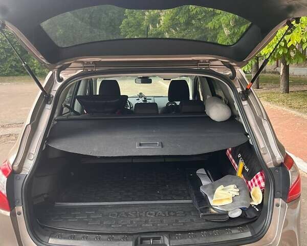 Коричневый Ниссан Кашкай 2, объемом двигателя 1.46 л и пробегом 268 тыс. км за 9900 $, фото 9 на Automoto.ua