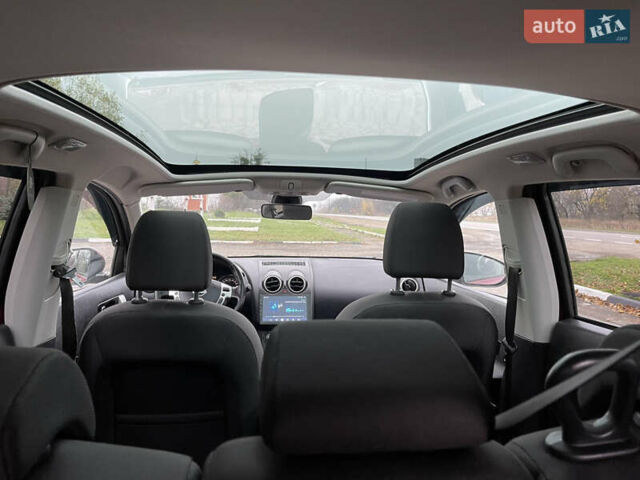 Червоний Ніссан Кашкай 2, об'ємом двигуна 1.6 л та пробігом 191 тис. км за 11300 $, фото 19 на Automoto.ua