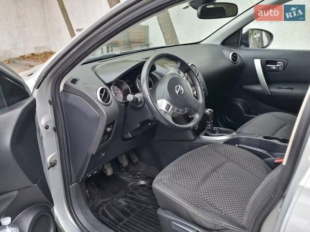 Сірий Ніссан Кашкай 2, об'ємом двигуна 1.46 л та пробігом 280 тис. км за 7699 $, фото 29 на Automoto.ua
