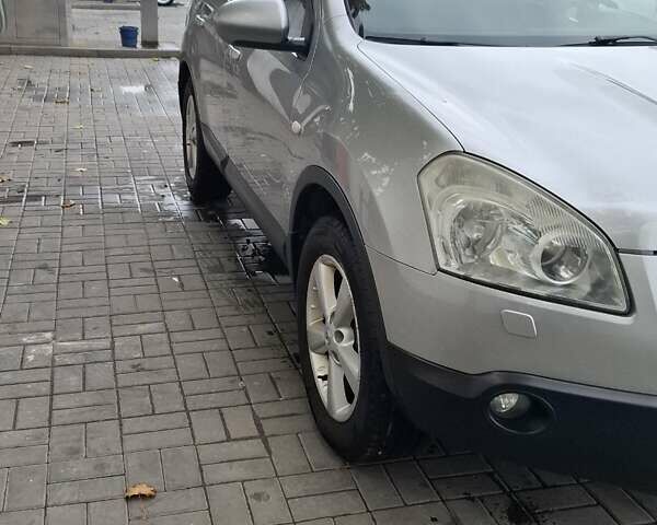 Сірий Ніссан Кашкай 2, об'ємом двигуна 1.46 л та пробігом 280 тис. км за 7650 $, фото 64 на Automoto.ua