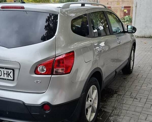 Сірий Ніссан Кашкай 2, об'ємом двигуна 1.46 л та пробігом 280 тис. км за 7699 $, фото 18 на Automoto.ua