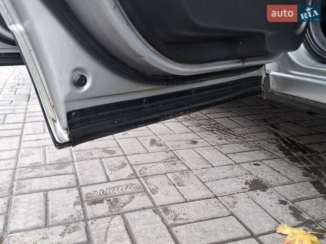 Сірий Ніссан Кашкай 2, об'ємом двигуна 1.46 л та пробігом 280 тис. км за 7650 $, фото 33 на Automoto.ua