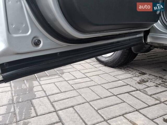 Сірий Ніссан Кашкай 2, об'ємом двигуна 1.46 л та пробігом 280 тис. км за 7699 $, фото 44 на Automoto.ua