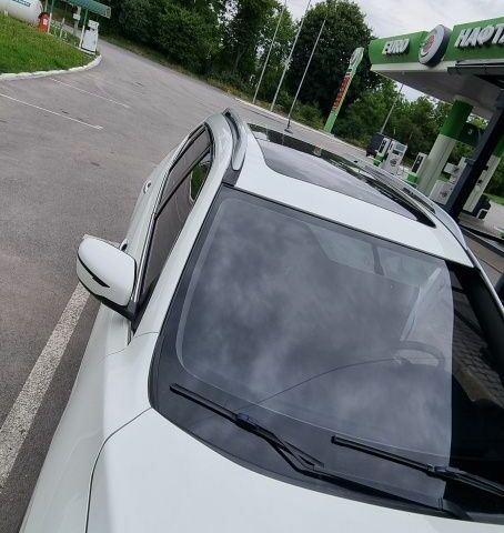 Белый Ниссан Rogue, объемом двигателя 2.5 л и пробегом 130 тыс. км за 12999 $, фото 2 на Automoto.ua