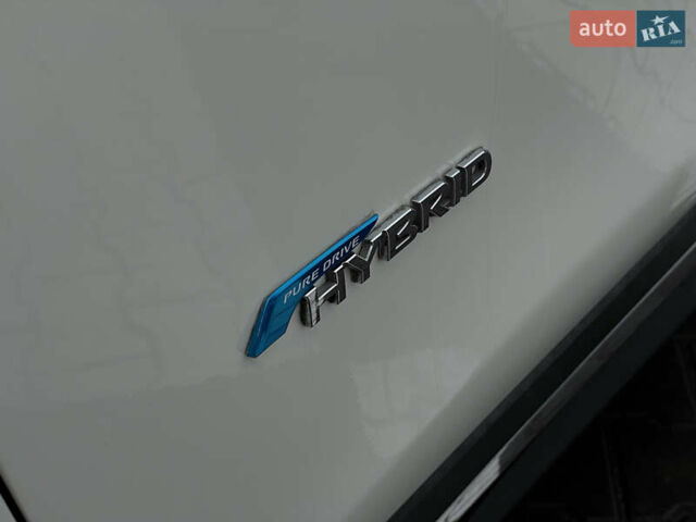 Белый Ниссан Rogue, объемом двигателя 2 л и пробегом 146 тыс. км за 17700 $, фото 2 на Automoto.ua