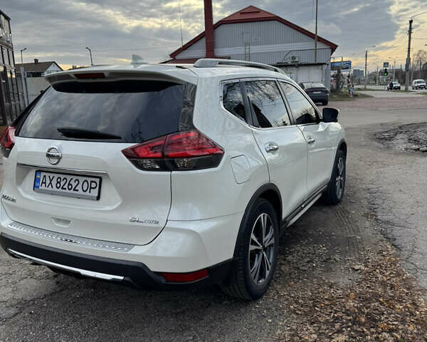 Белый Ниссан Rogue, объемом двигателя 2.49 л и пробегом 107 тыс. км за 16800 $, фото 4 на Automoto.ua