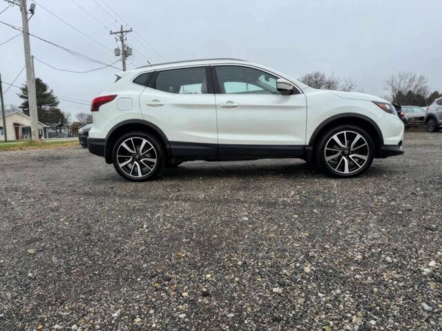 Белый Ниссан Rogue, объемом двигателя 2 л и пробегом 34 тыс. км за 1900 $, фото 3 на Automoto.ua