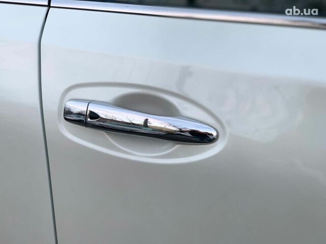 Белый Ниссан Rogue, объемом двигателя 2.5 л и пробегом 144 тыс. км за 14890 $, фото 4 на Automoto.ua