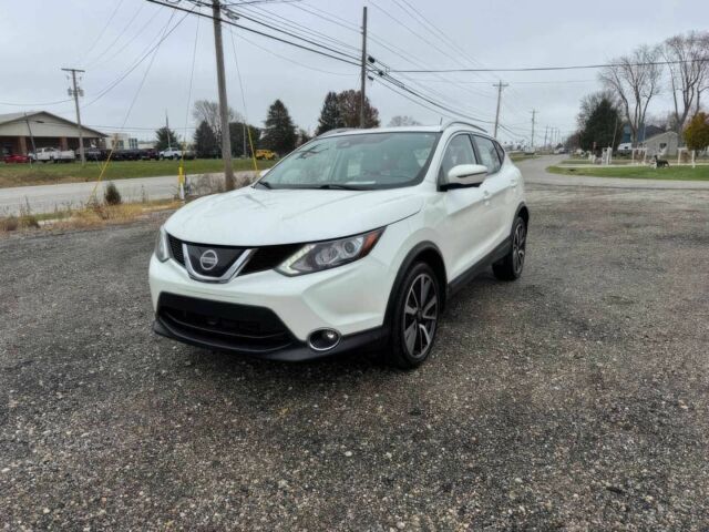 Белый Ниссан Rogue, объемом двигателя 2 л и пробегом 34 тыс. км за 1900 $, фото 2 на Automoto.ua