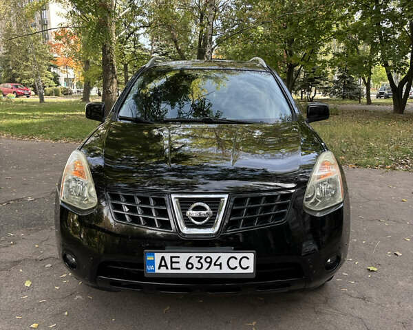 Черный Ниссан Rogue, объемом двигателя 2.5 л и пробегом 286 тыс. км за 6650 $, фото 1 на Automoto.ua