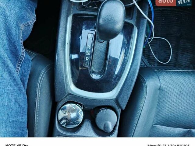 Черный Ниссан Rogue, объемом двигателя 2.49 л и пробегом 261 тыс. км за 12700 $, фото 6 на Automoto.ua