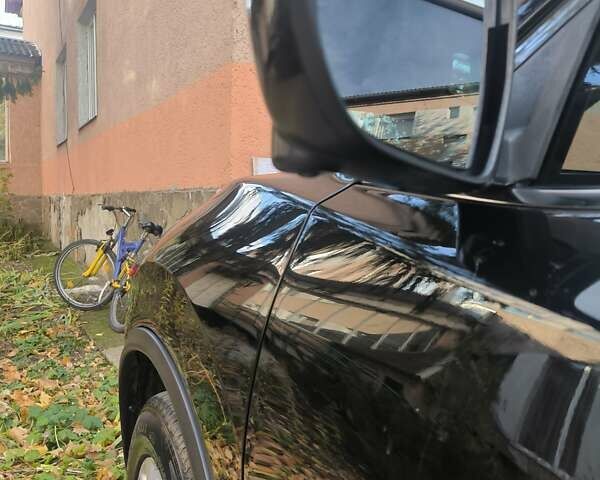 Черный Ниссан Rogue, объемом двигателя 2.49 л и пробегом 270 тыс. км за 13100 $, фото 2 на Automoto.ua