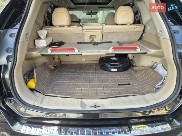 Черный Ниссан Rogue, объемом двигателя 2.49 л и пробегом 135 тыс. км за 14000 $, фото 7 на Automoto.ua