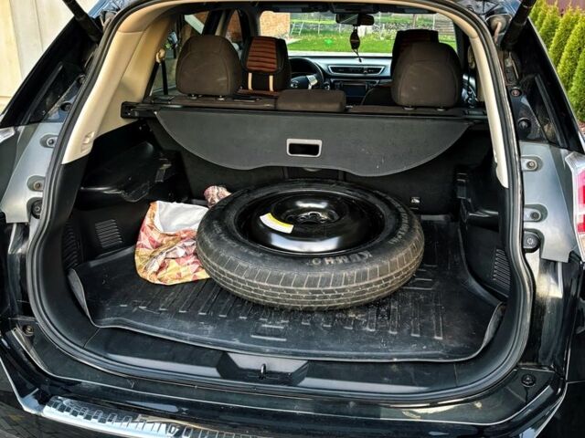 Черный Ниссан Rogue, объемом двигателя 2.4 л и пробегом 120 тыс. км за 14200 $, фото 4 на Automoto.ua