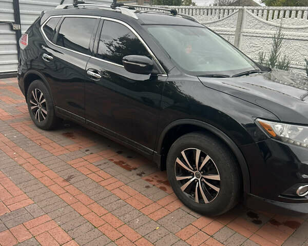 Черный Ниссан Rogue, объемом двигателя 2.49 л и пробегом 182 тыс. км за 12000 $, фото 1 на Automoto.ua
