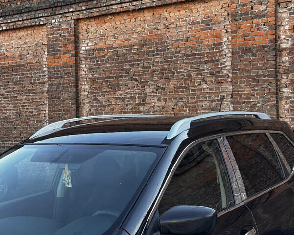 Черный Ниссан Rogue, объемом двигателя 2.49 л и пробегом 187 тыс. км за 11800 $, фото 11 на Automoto.ua