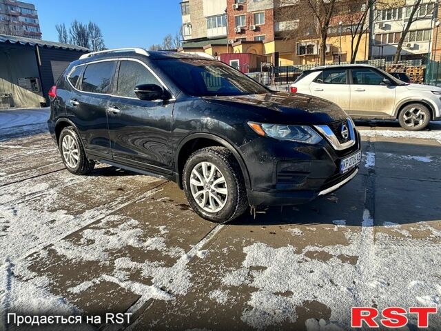 Черный Ниссан Rogue, объемом двигателя 2.5 л и пробегом 147 тыс. км за 12700 $, фото 2 на Automoto.ua
