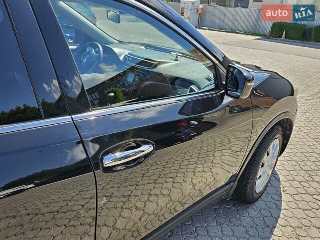 Черный Ниссан Rogue, объемом двигателя 2.49 л и пробегом 125 тыс. км за 12700 $, фото 5 на Automoto.ua