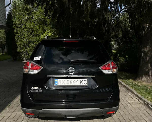Черный Ниссан Rogue, объемом двигателя 2.5 л и пробегом 115 тыс. км за 10100 $, фото 1 на Automoto.ua