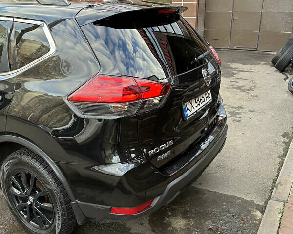 Черный Ниссан Rogue, объемом двигателя 2.49 л и пробегом 118 тыс. км за 16500 $, фото 3 на Automoto.ua